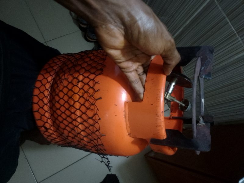 Used gas cylinder with burner